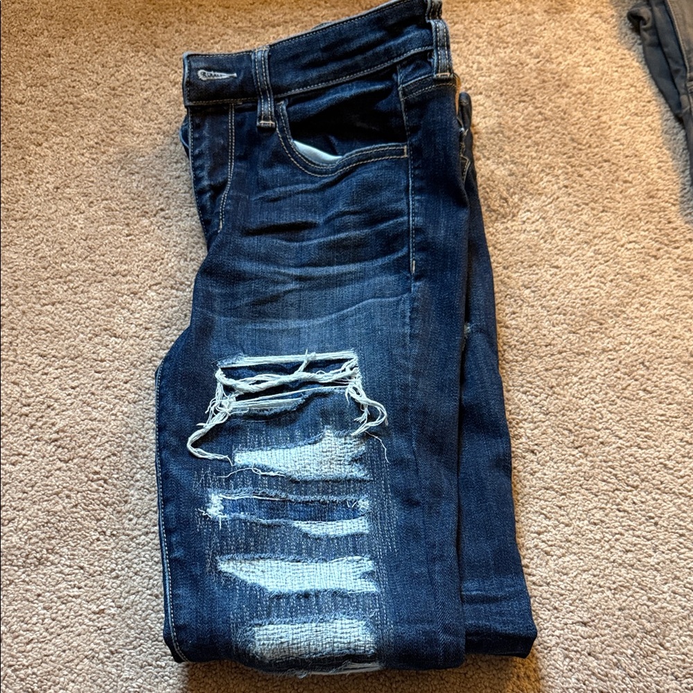American Eagle super super stretch X Distressed Blue Jeans